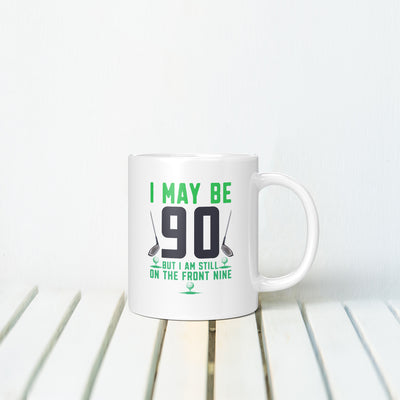 I MAY BE 90 MUG